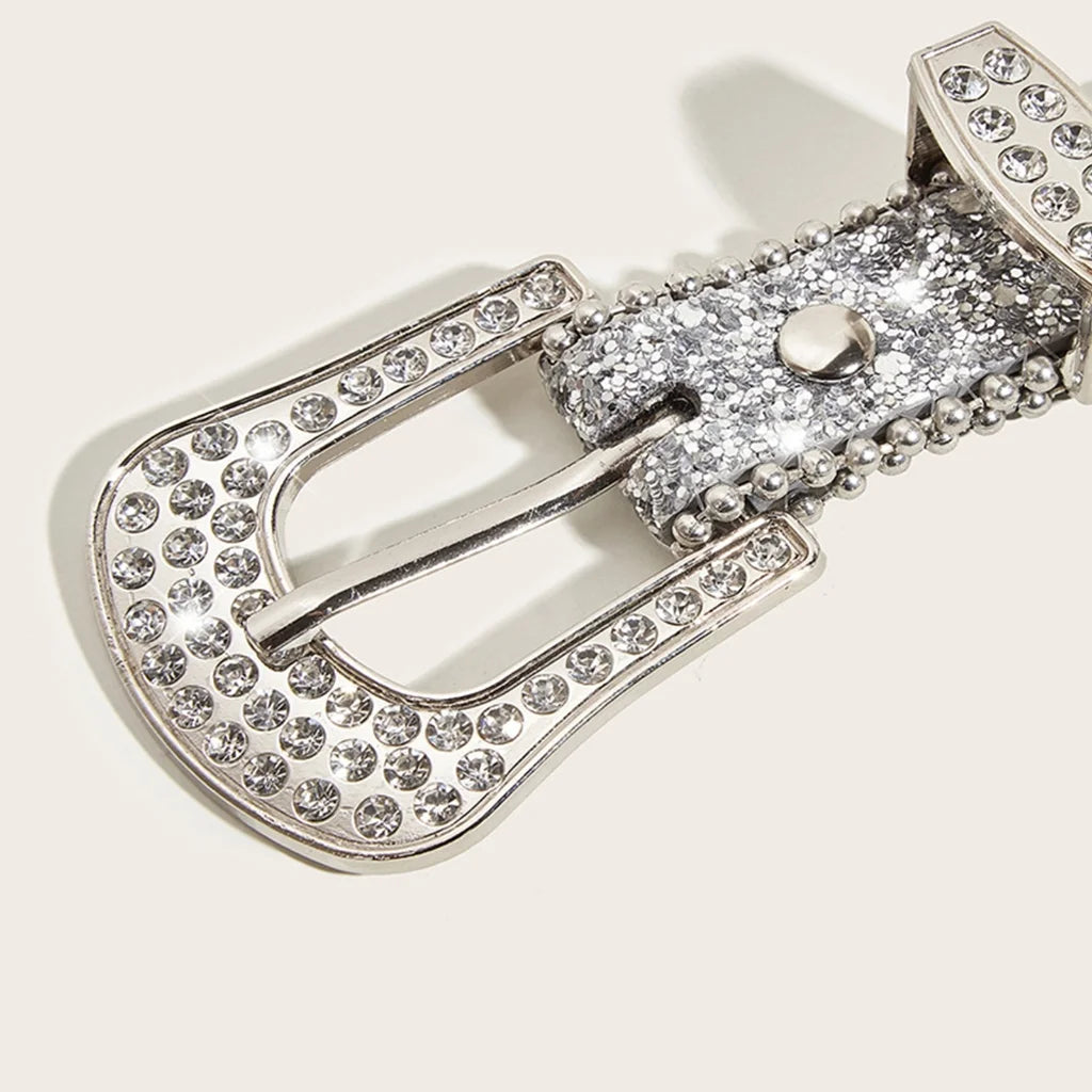 Close-up of a sparkling rhinestone belt for women showcasing a big buckle with intricate embellishments.